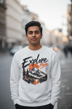 Man on a city street in a white Explore More printed fleece sweatshirt